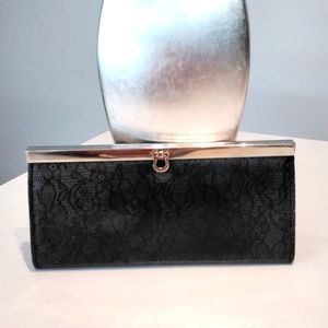 Ladies dark gray floral clutch
